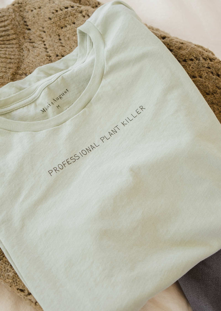 agave color t-shirt with Professional Plant Killer phrase in pima cotton by mimi and august