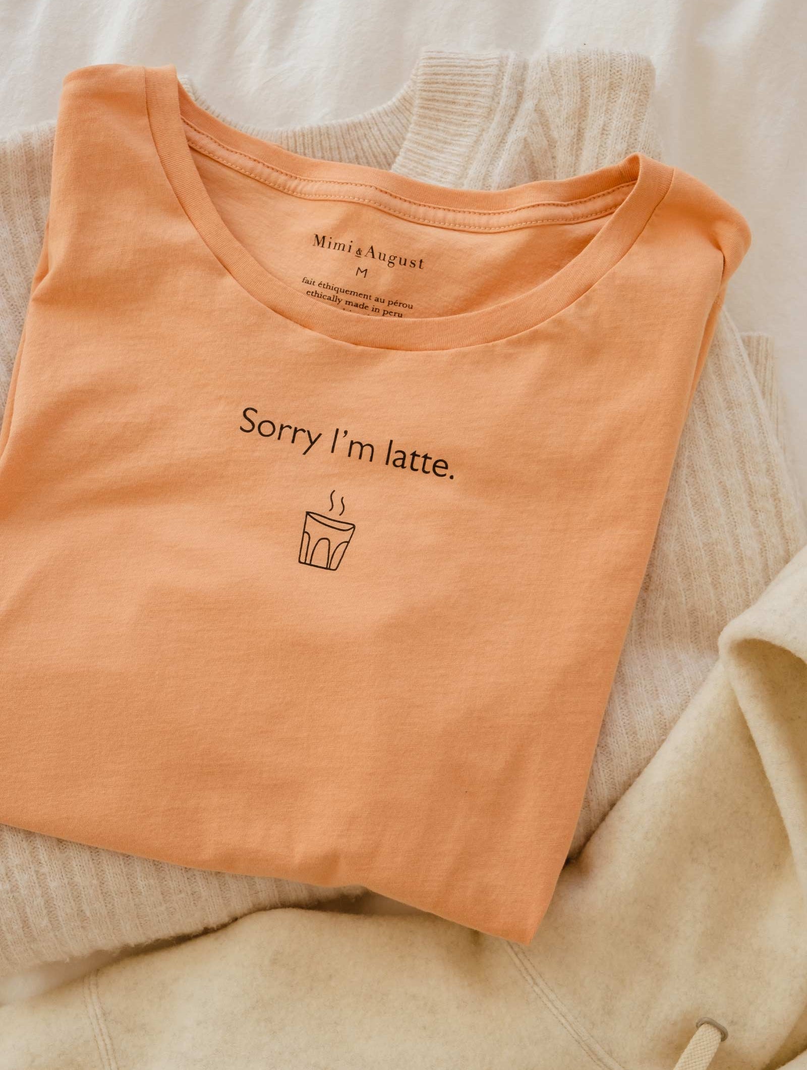 super comfortable t shirt made of pima cotton in bed with other clothes to create a look