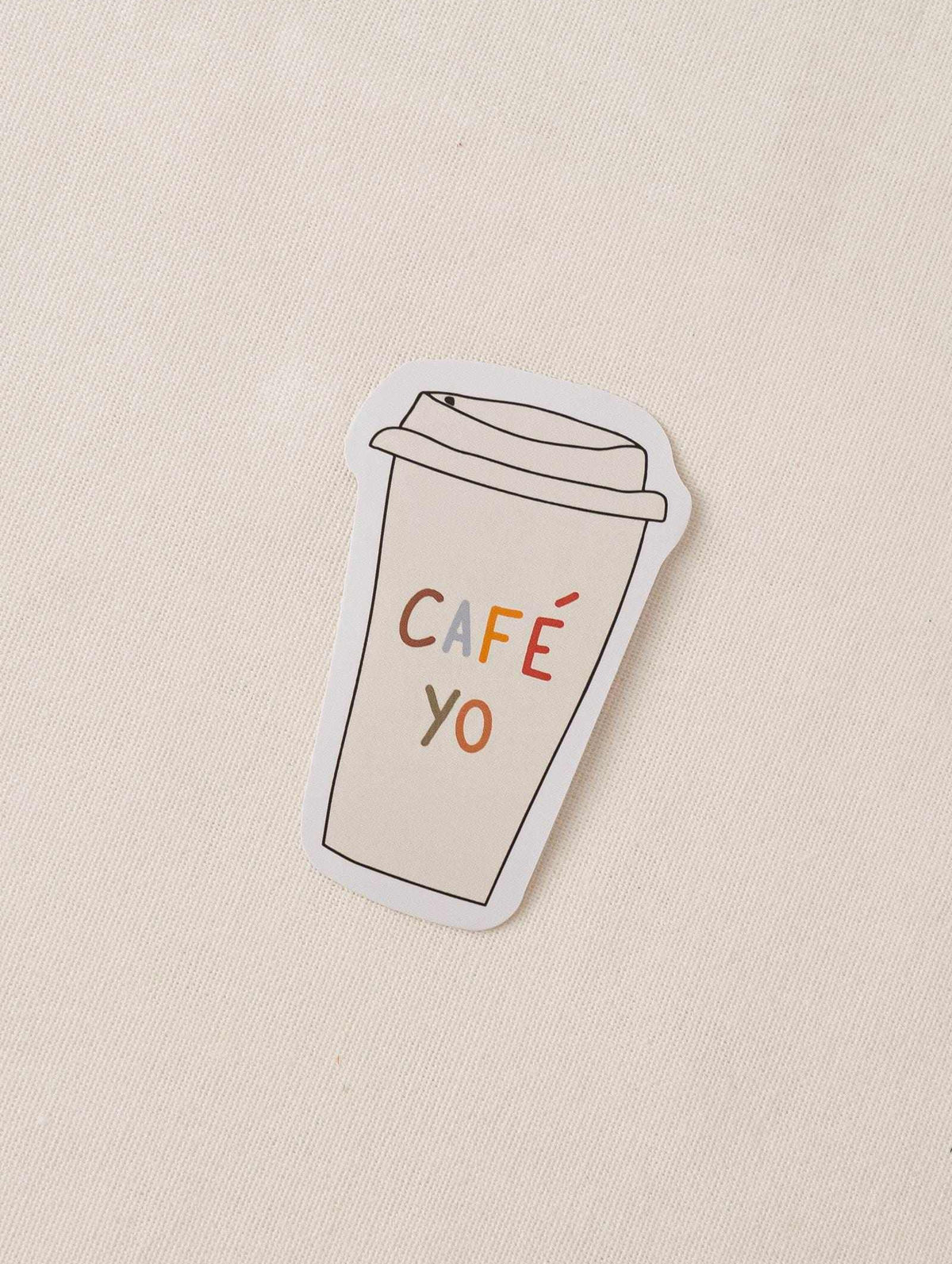 Vinyl sticker of a coffee cup with café yo text, durable and water-resistant design