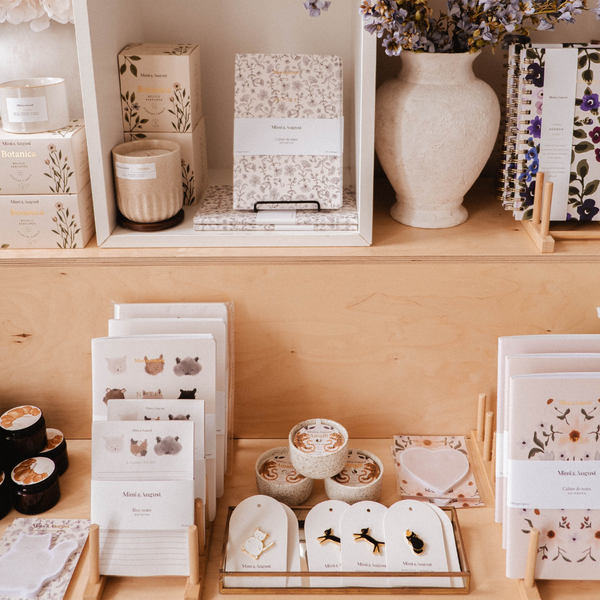 Handmade ceramics and illustrated products on display at Mimi & August