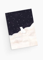 An illustration of a white bear sitting on snowy ground beneath a starry night sky, capturing the cozy charm of Christmas greeting cards in the "Bear-y Merry Wishes Under the Stars" by Mimi & August.