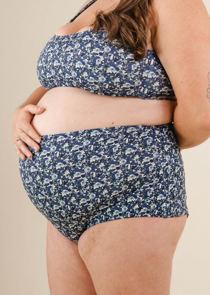 A pregnant woman with a Blue Moonflower Extra High Waist Bikini Bottom 