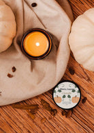 2 oz Citrouille pumpkin spice candle in reusable glass with warm pumpkin and spice scent