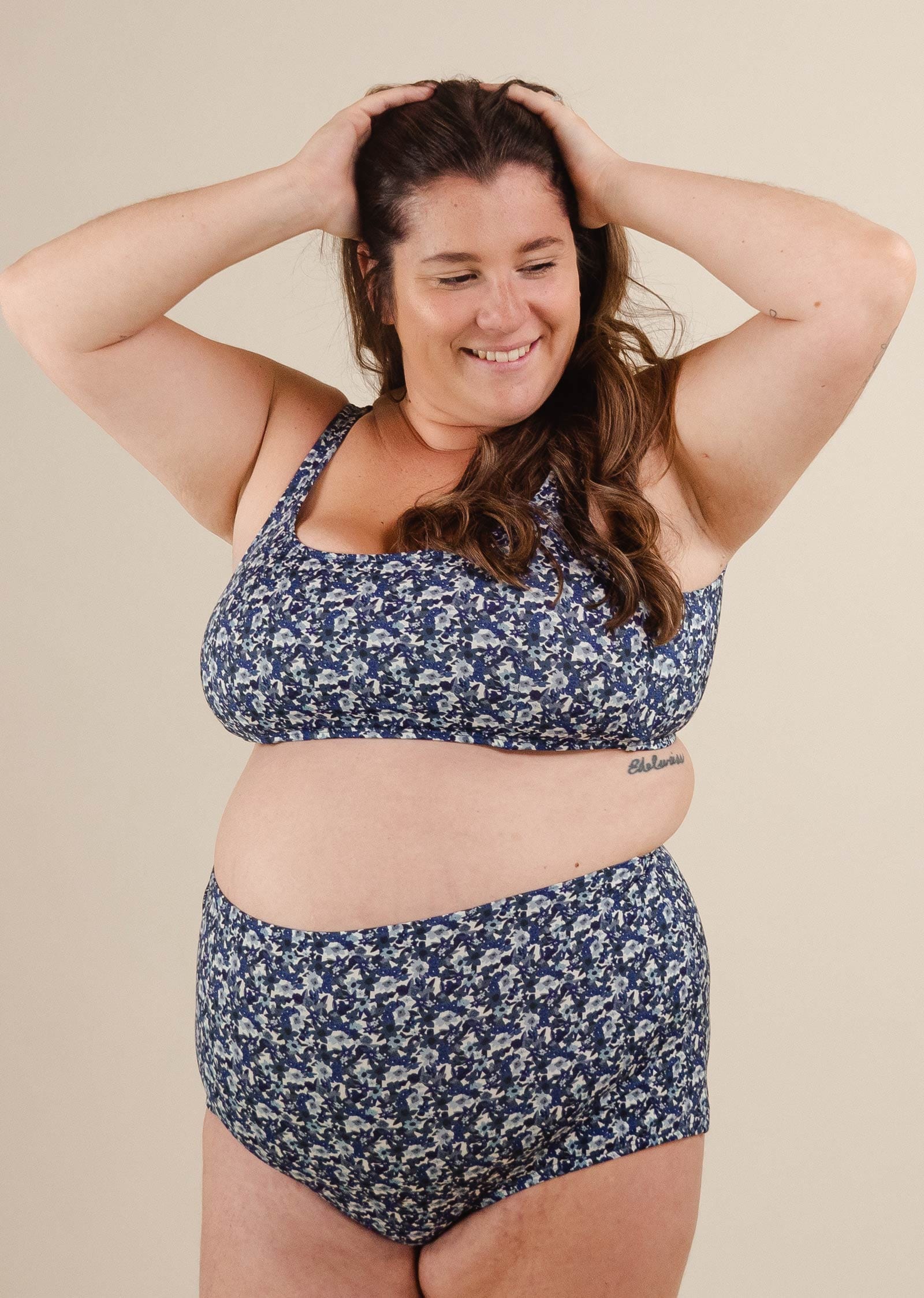 A Lima Moonflower Bralette Bikini Top on a pregnant woman.