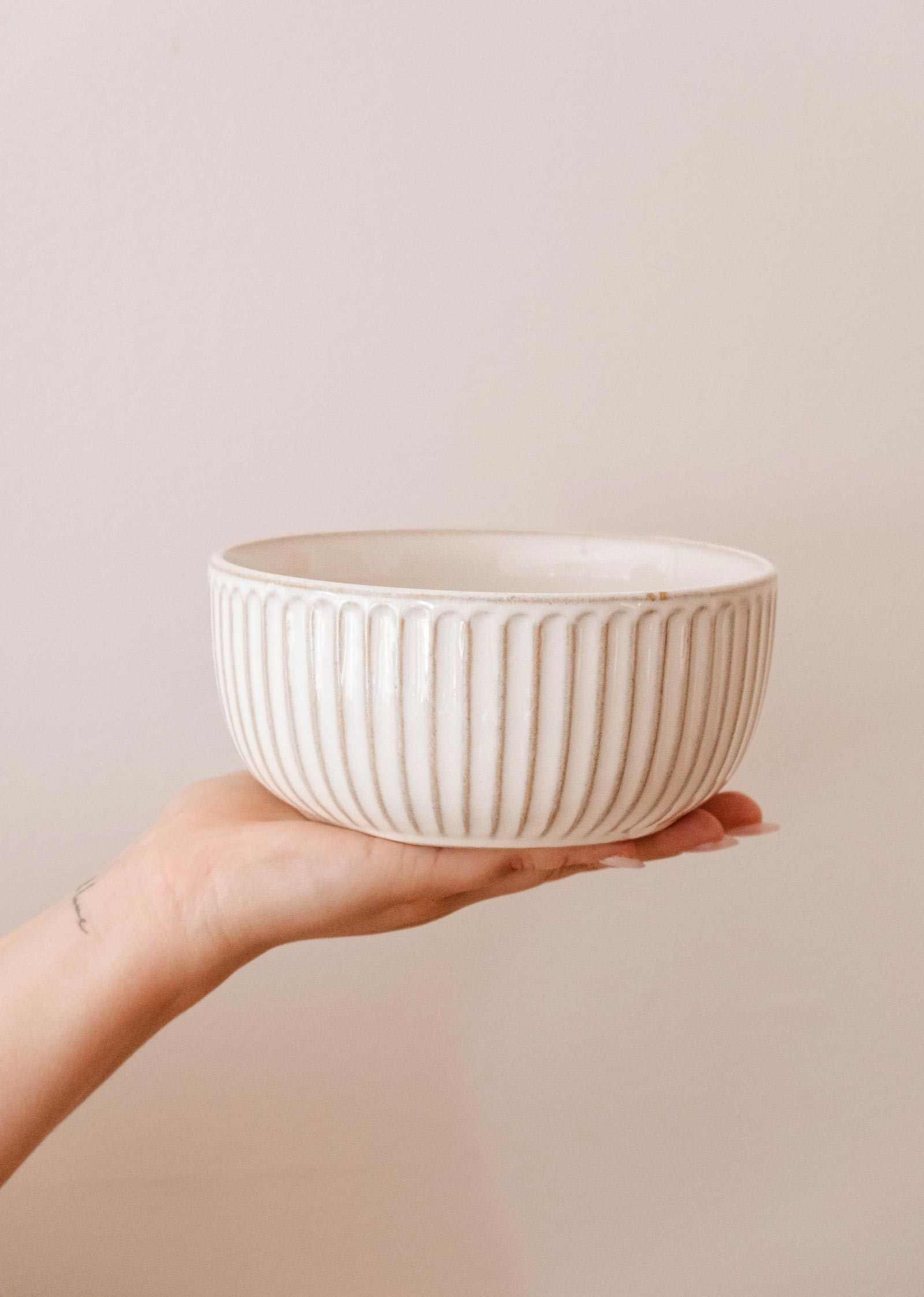 Ribbed ceramic bowl by Mimi & August, round handmade design with cream glaze