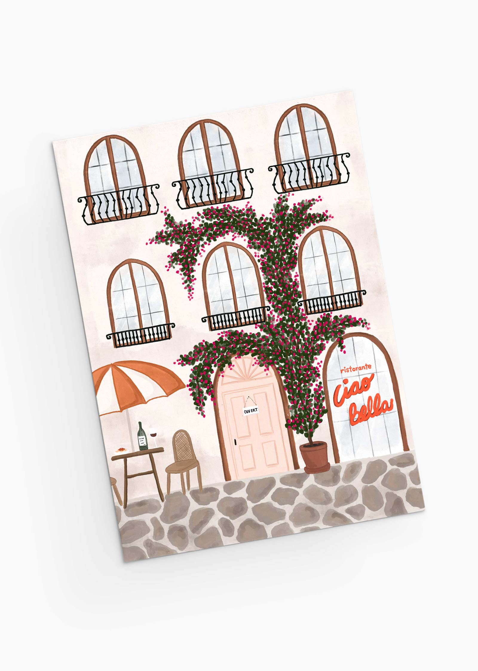 Capture a charming Italian cafe scene with a pink door, large windows, and blooming vines on the Ristorante Greeting Card by Mimi & August. Featuring an outdoor table under an umbrella by the "Ciao Bella" sign, it's perfect for greeting cards or restaurant themes. Printed on recycled paper for eco-friendliness.