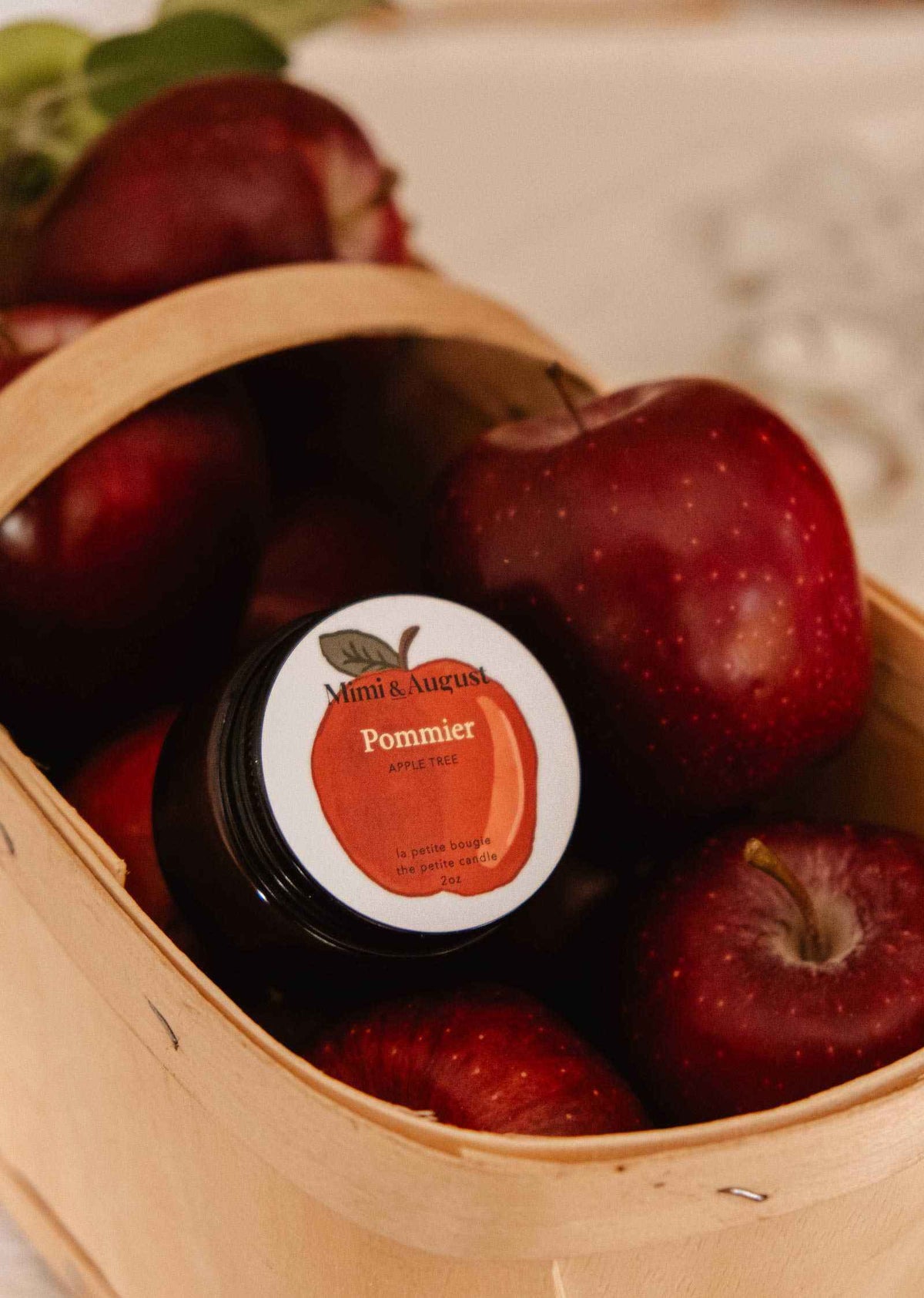 2 oz pommier apple cinnamon soy candle in glass jar