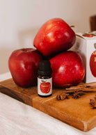 Flacon d'huile parfumée pomme cannelle pour diffuseur avec arômes de pomme fraîche et épices chaudes