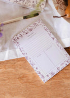 Blossom - Notepad with black and white floral border, 50-page recycled paper memo pad for organization and planning