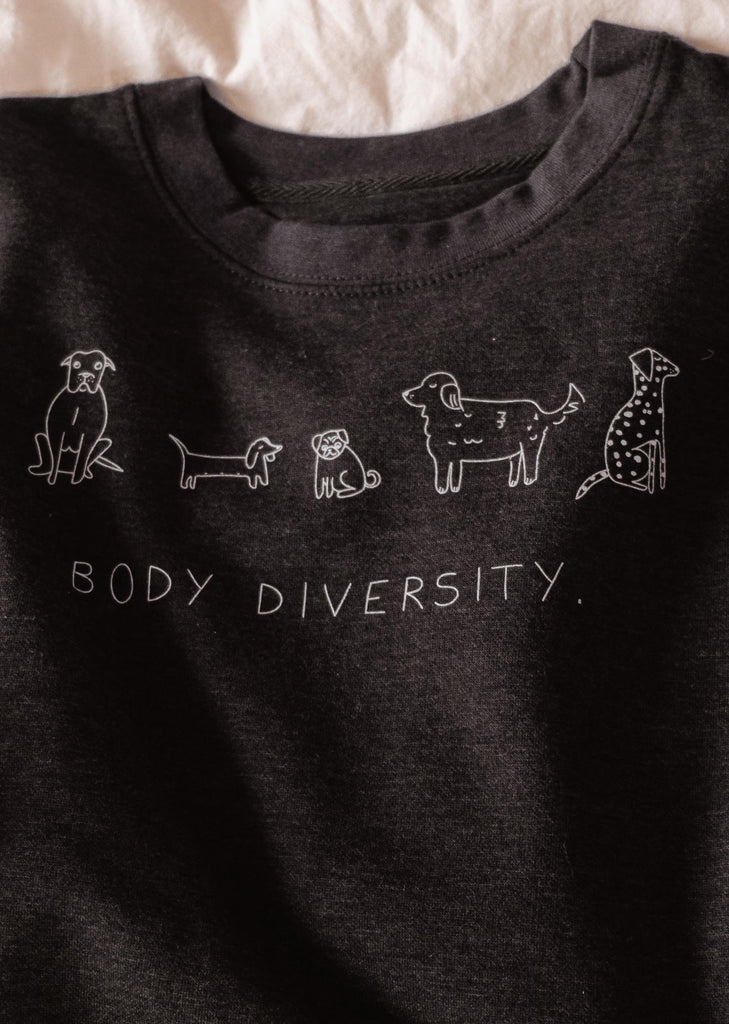 A comfortable Doggo Diversity Sweatshirt with the brand name Mimi & August on it.