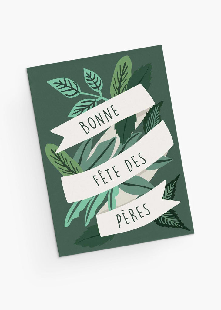A green greeting card with a ribbon that says bonne fete des peres