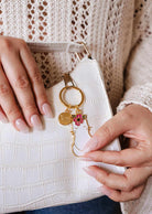 Floral cat keychain enamel charm with pink flower and gold brass finish