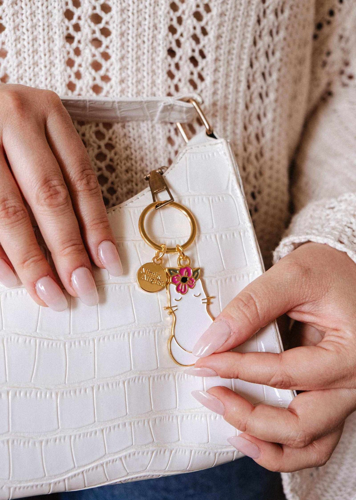 Floral cat keychain enamel charm with pink flower and gold brass finish