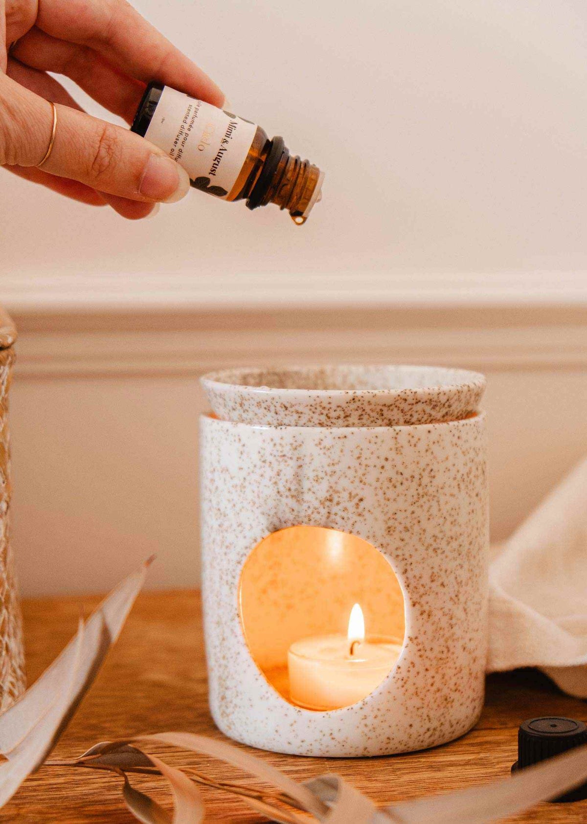 bottle of forest scented oil with fir and cedarwood aroma