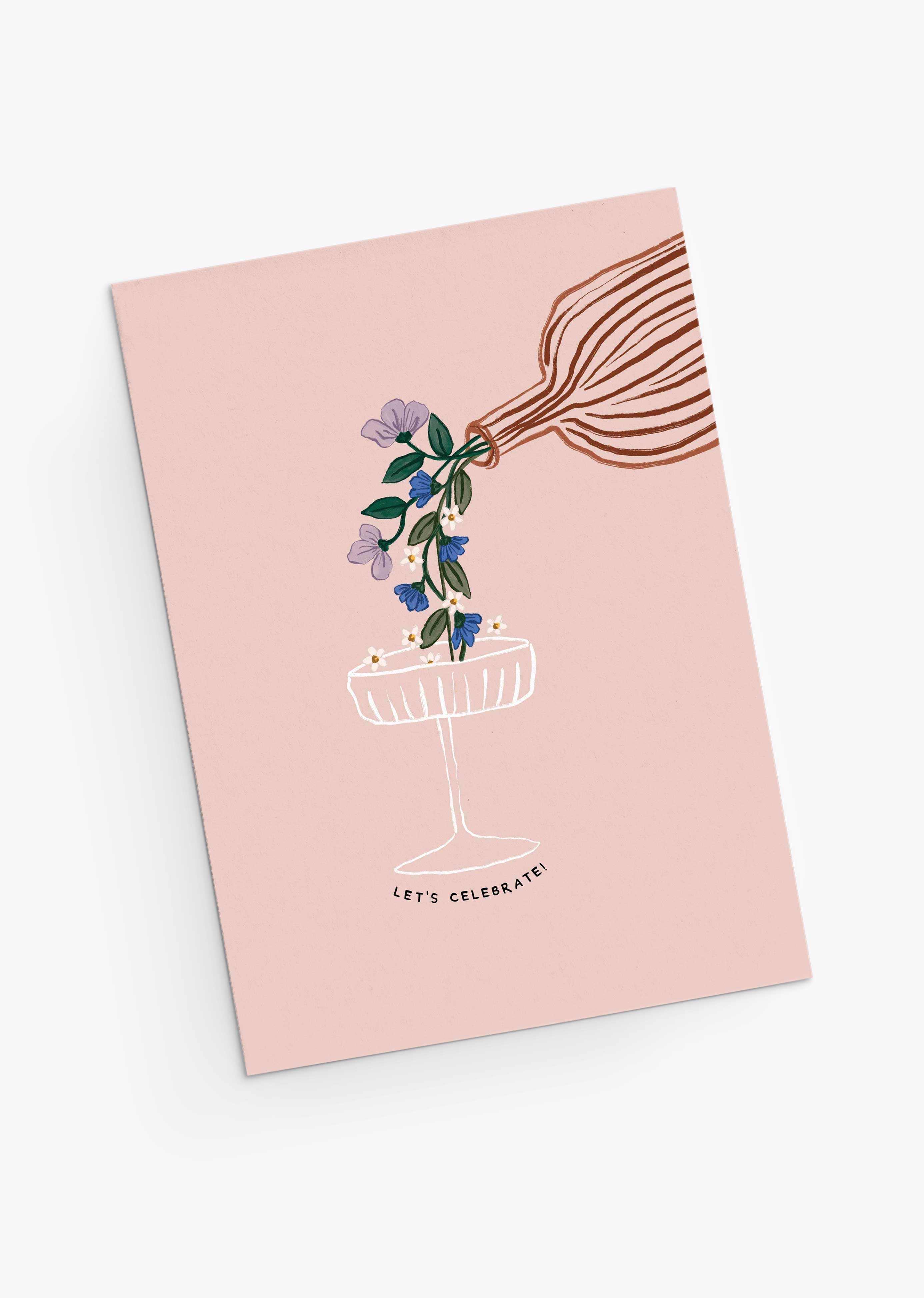 Let's Celebrate Greeting Card with whimsical bouquet flowing into a coupe glass on soft pink background