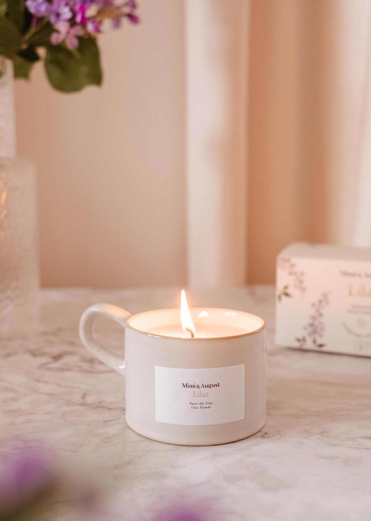 Lilac reusable candle in speckled gray cup with calming lilac scent for aromatherapy and home decor