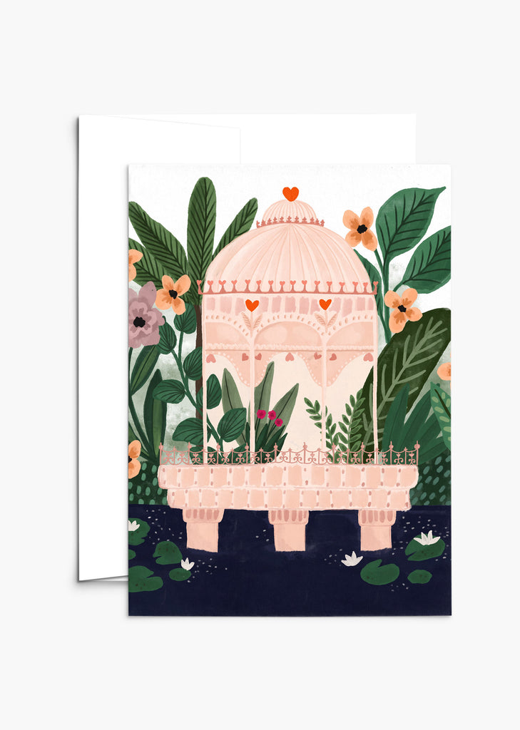 Carte de voeux d'un palais rose entouré de fleurs et de plantes colorées. Par Mimi & August, faite à Montréal 