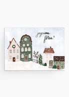 Snowy village Christmas card with cozy homes and twinkling snowflakes on recycled paper