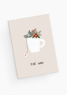 cute teacup filled with flowers saying thé amo- By Mimi & August