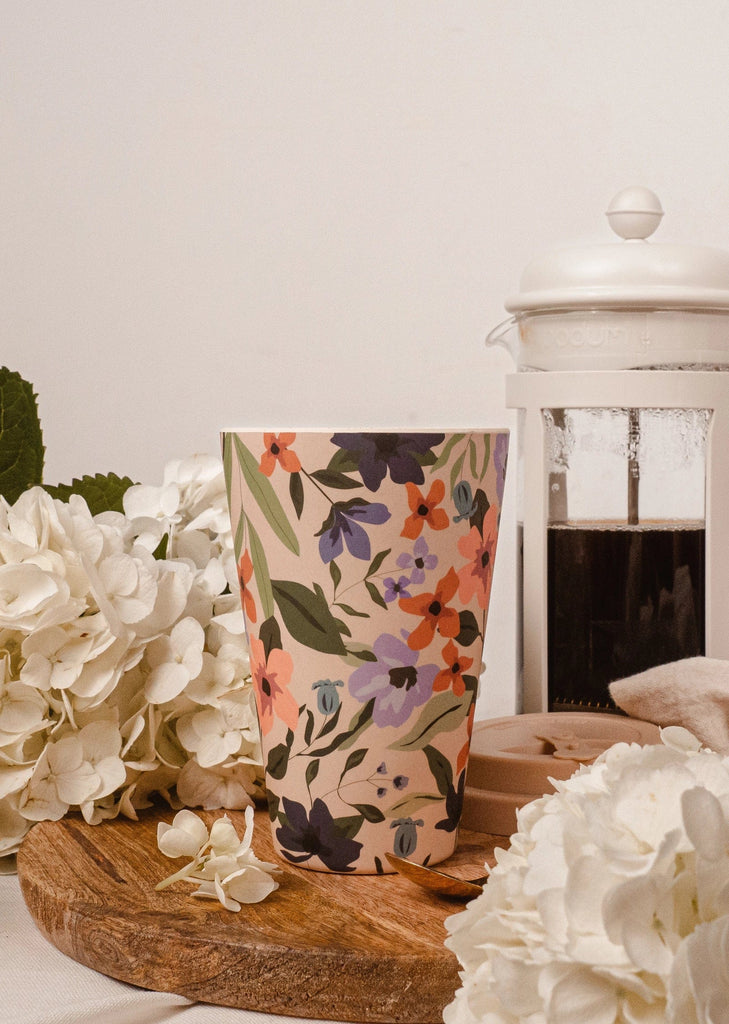 Delicate petals and stunning blossoms adorn this exquisite reusable cafe yo cup
