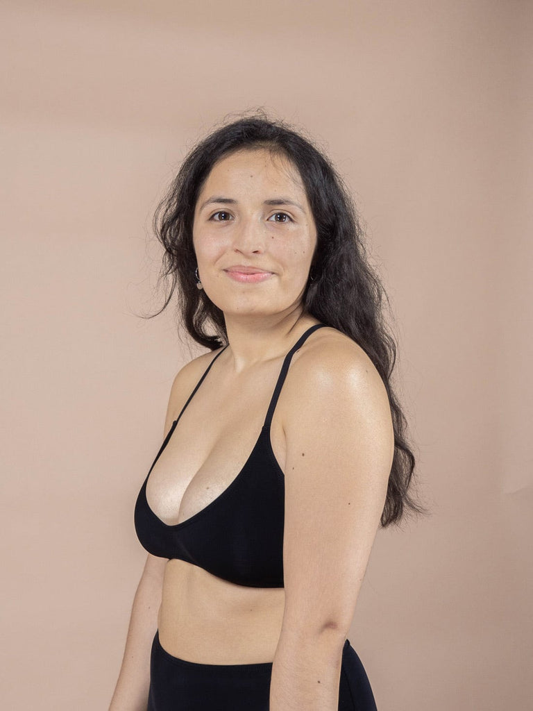chichi black bralette bikini top is made from econyl recycled materials mimi and august
