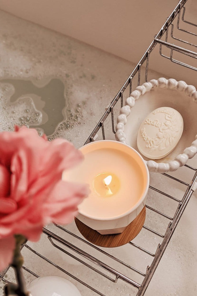 Mare scented soy wax candle in the bathroom by Mimi & August