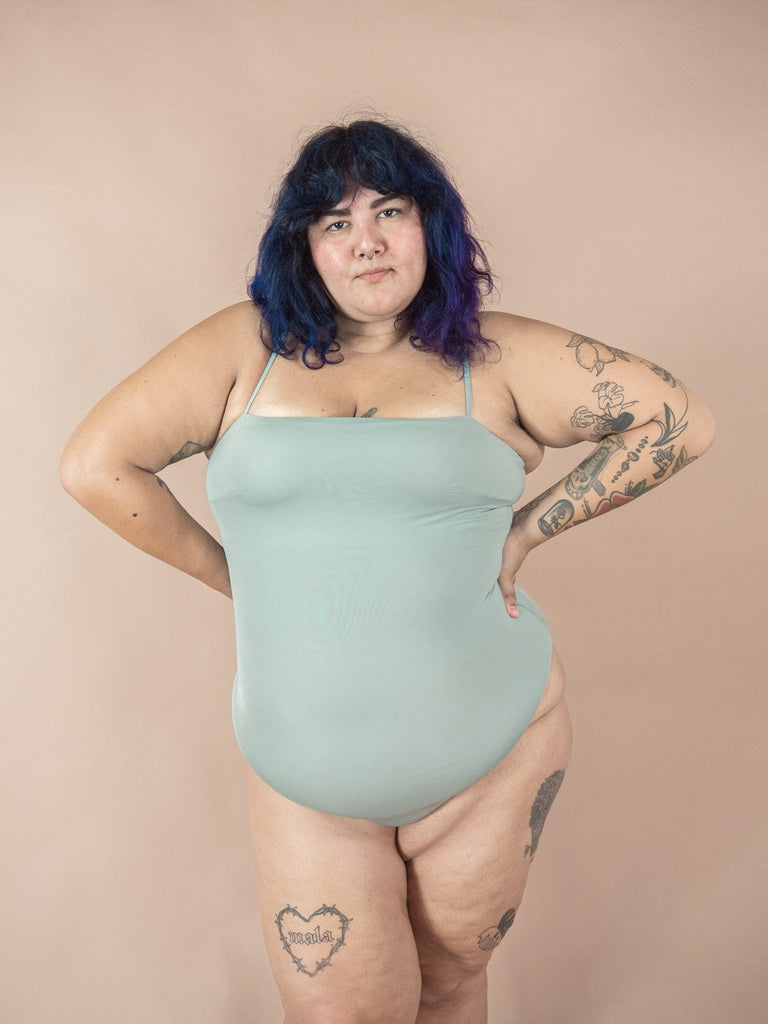 Sandra wearing the nohea agave one piece size 3XL