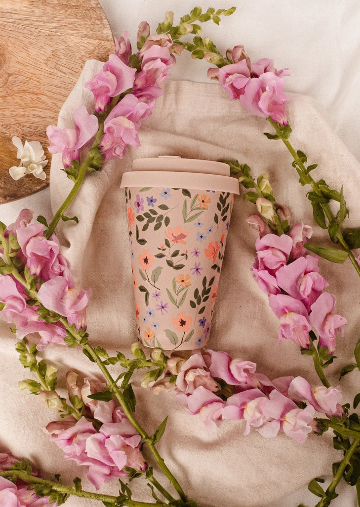  Reusable Cup adorned with whimsical illustrations of blooming flowers by mimi and august