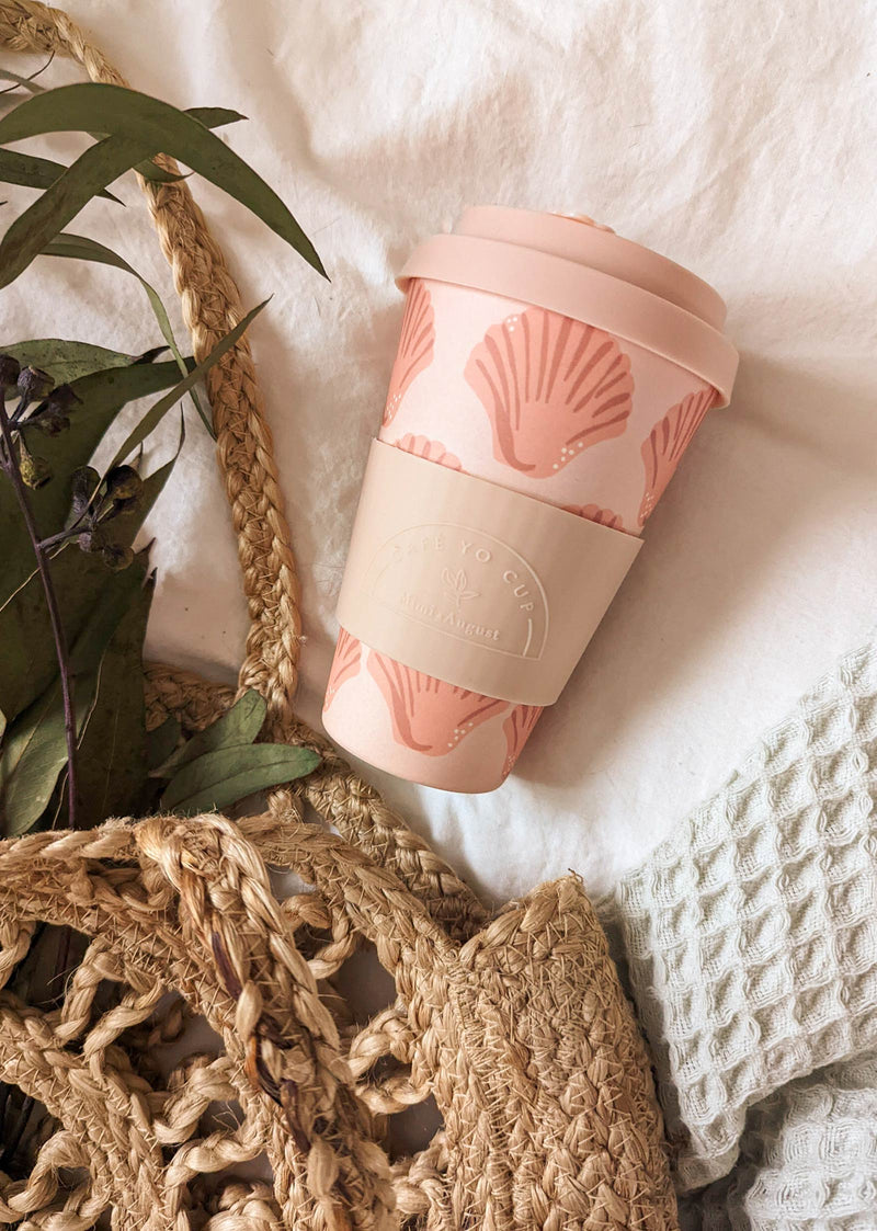 Reusable mug for warm and cold beverages with seashell illustrations