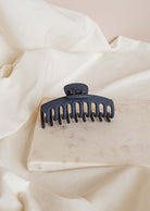 very strong matte blue hair clip that is perfect for creating all types of hairstyles