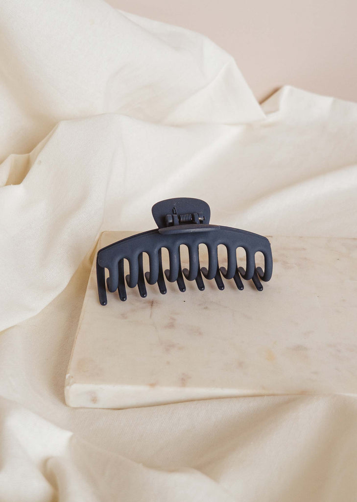 very strong matte blue hair clip that is perfect for creating all types of hairstyles