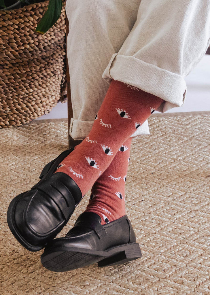 burgundy socks with illustration eyes mimi and august