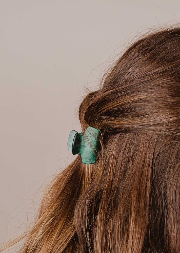 Marble green mini hair clip by mimi and august hang on beautiful straight hair