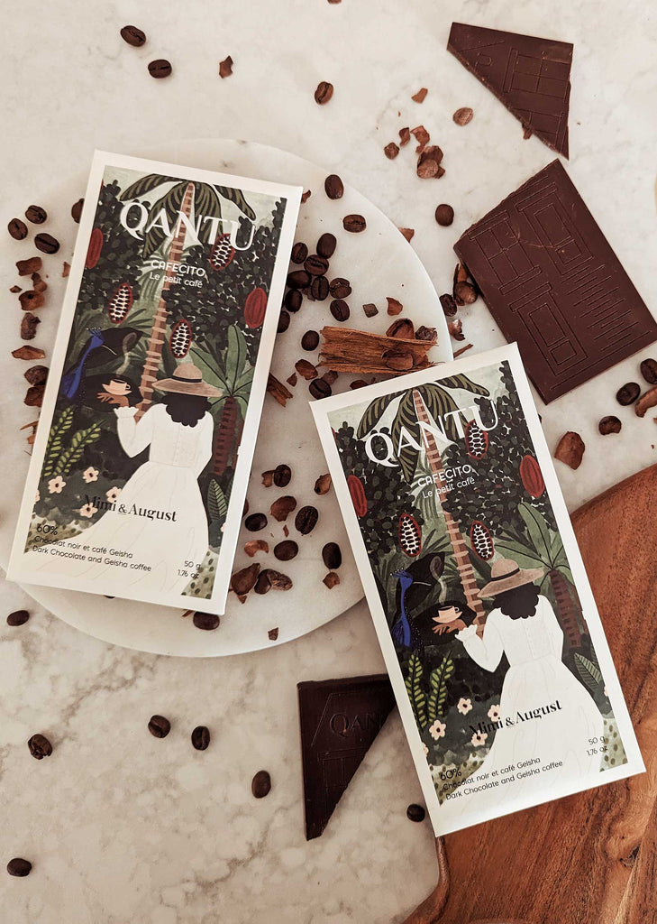 two dark chocolate bars with mimi and august illustrations