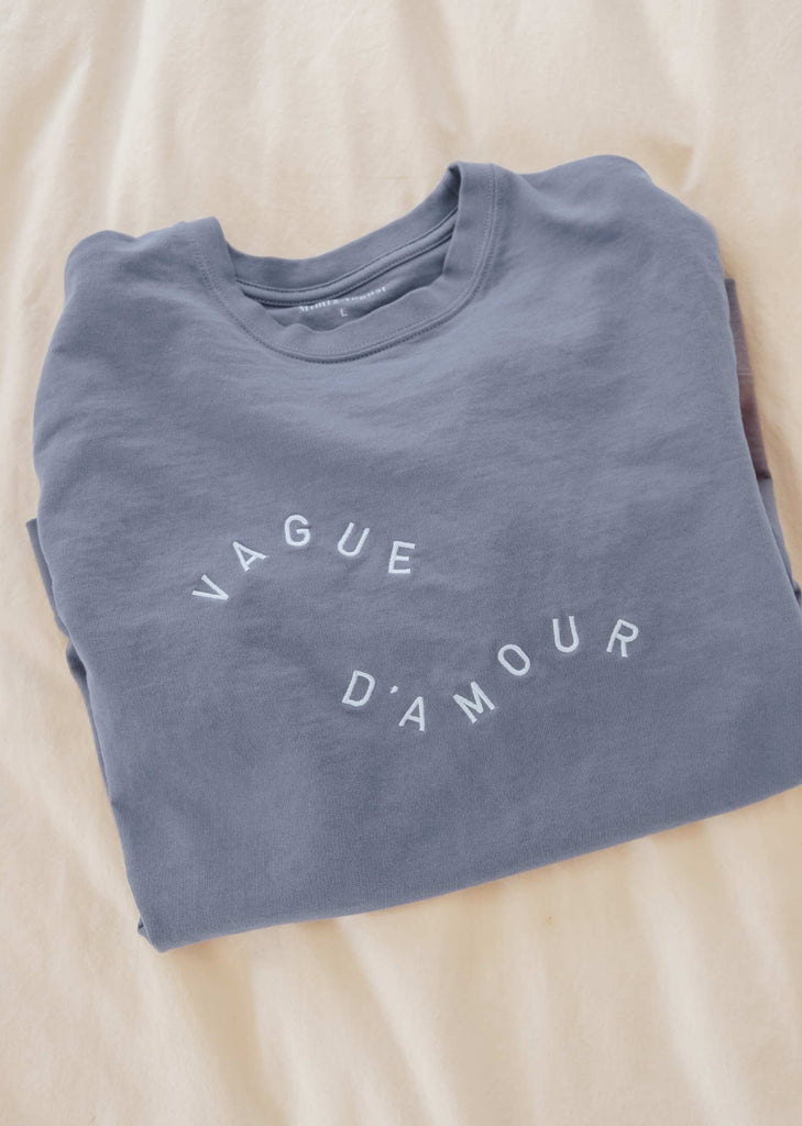 sweater bend color light blue embroider with the phrase VAGUE D'AMOUR by Mimi and august
