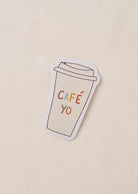 Vinyl sticker of a coffee cup with café yo text, durable and water-resistant design